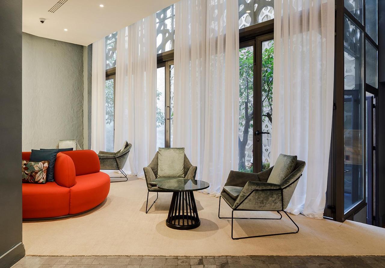 Eme Catedral Mercer Hotel Sevilla Bagian luar foto The interior of the hotel